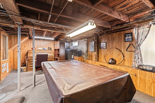 interior space featuring billiards, wood walls, and light colored carpet