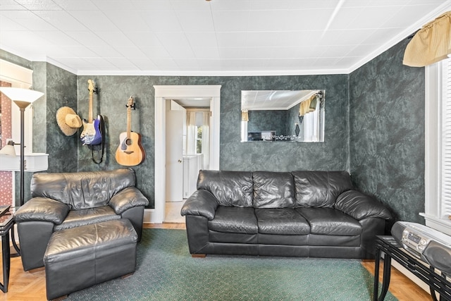 living room with parquet flooring and crown molding