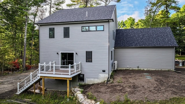 rear view of house with a deck