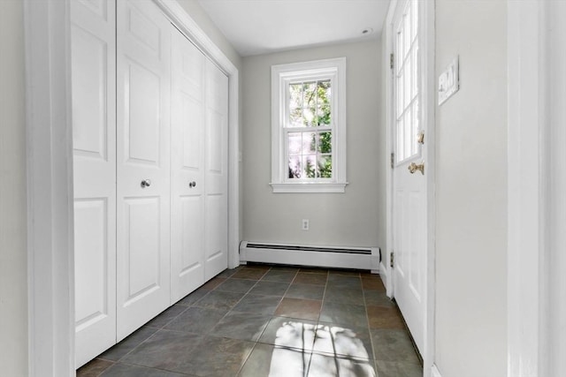 17 Topsfield Rd, Wenham, MA 01984 - foyer with baseboard heating, dark stone finish flooring, and baseboards
