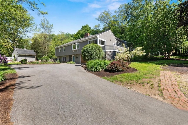 17 Topsfield Rd, Wenham, MA 01984 - view of front of house featuring asphalt driveway and a chimney