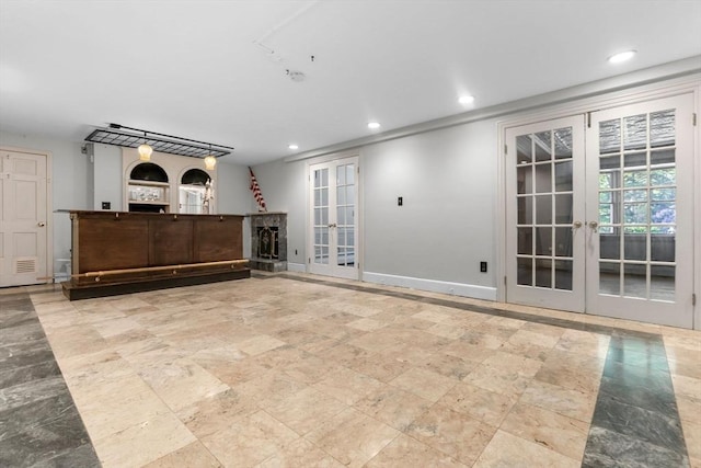 17 Topsfield Rd, Wenham, MA 01984 - unfurnished living room with french doors, recessed lighting, and baseboards