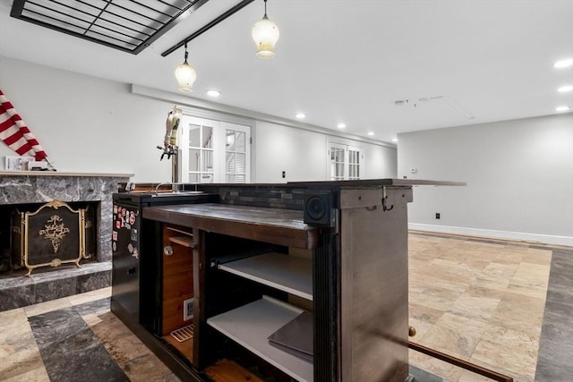 17 Topsfield Rd, Wenham, MA 01984 - bar area featuring recessed lighting, a premium fireplace, french doors, baseboards, and hanging light fixtures