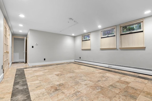 17 Topsfield Rd, Wenham, MA 01984 - basement with baseboards, baseboard heating, recessed lighting, plenty of natural light, and light stone finish floors