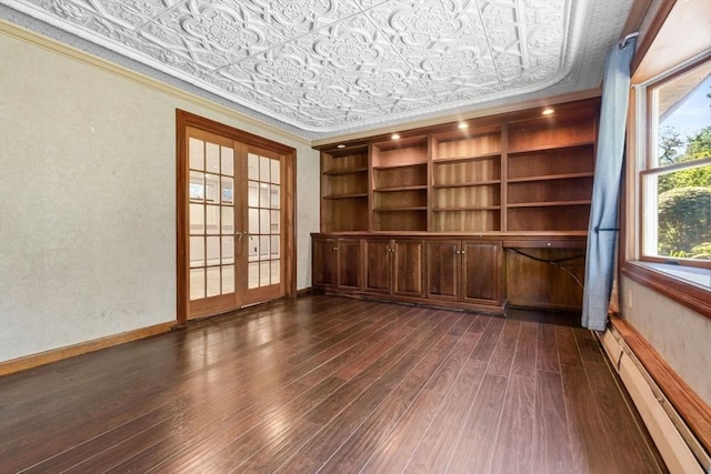 17 Topsfield Rd, Wenham, MA 01984 - unfurnished room featuring an ornate ceiling, baseboard heating, dark wood-type flooring, french doors, and baseboards