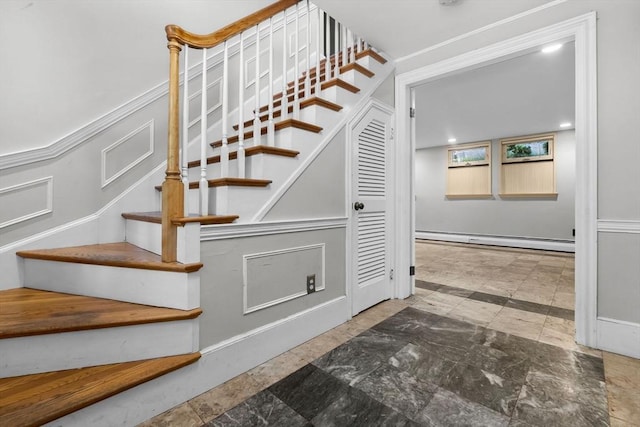 17 Topsfield Rd, Wenham, MA 01984 - stairway with a baseboard heating unit and a decorative wall