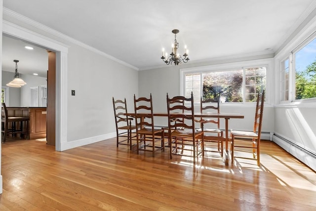 17 Topsfield Rd, Wenham, MA 01984 - dining area with light wood-type flooring, a chandelier, baseboards, ornamental molding, and recessed lighting