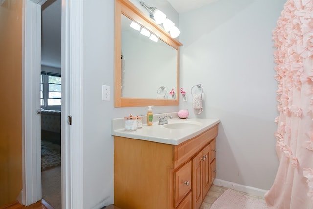 bathroom with vanity and tile patterned floors