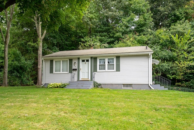 view of front of house with a front lawn