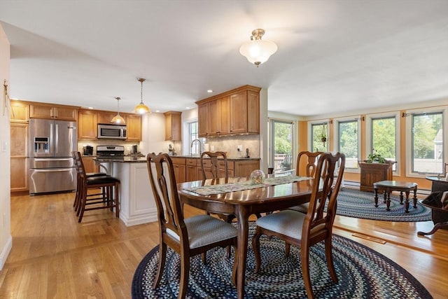 128 S Sea Ave, Yarmouth, MA 02673 - dining room with light wood-type flooring and recessed lighting