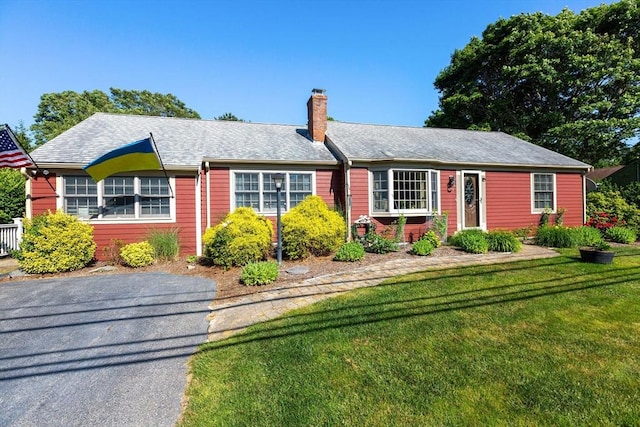 128 S Sea Ave, Yarmouth, MA 02673 - ranch-style home with a chimney and a front lawn