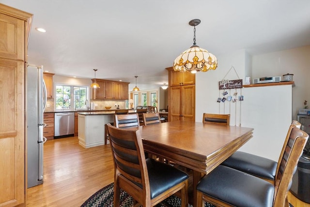128 S Sea Ave, Yarmouth, MA 02673 - dining area with light wood-type flooring and recessed lighting