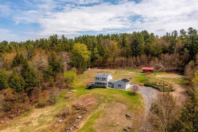 drone / aerial view with a view of trees