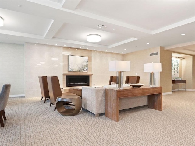 living area featuring recessed lighting, light colored carpet, a fireplace, and baseboards