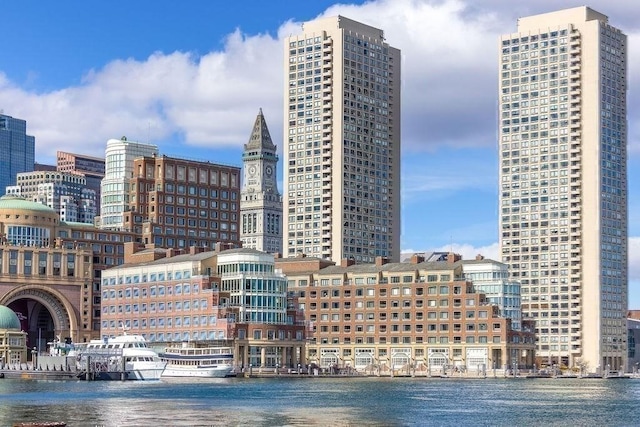 property's view of city with a water view