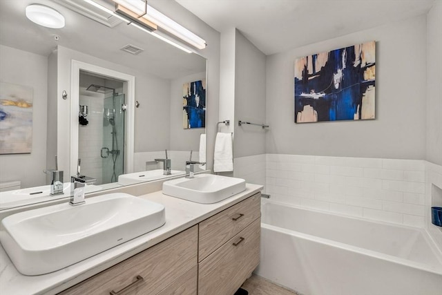 full bathroom with vanity, toilet, and shower with separate bathtub