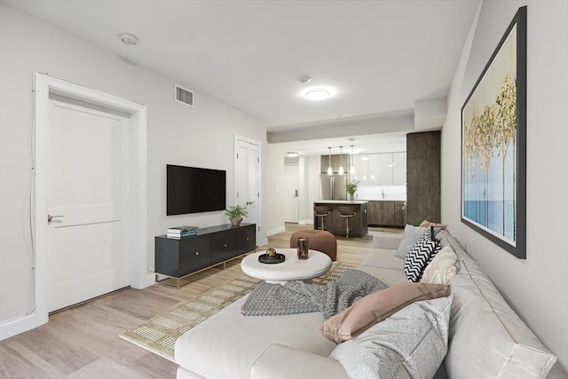 living room with light wood-type flooring