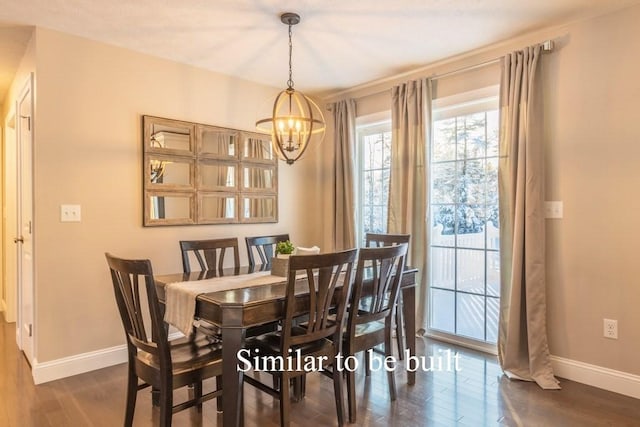 dining space featuring a notable chandelier and dark hardwood / wood-style flooring