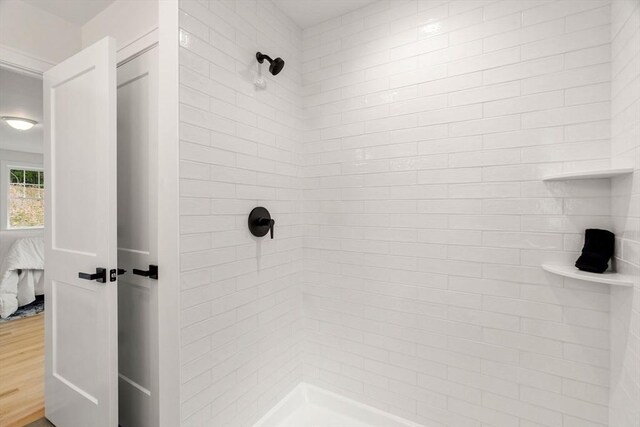 10 Sylvan Hill Xing, Haverhill, MA 01832 - ensuite bathroom featuring a tile shower and wood finished floors