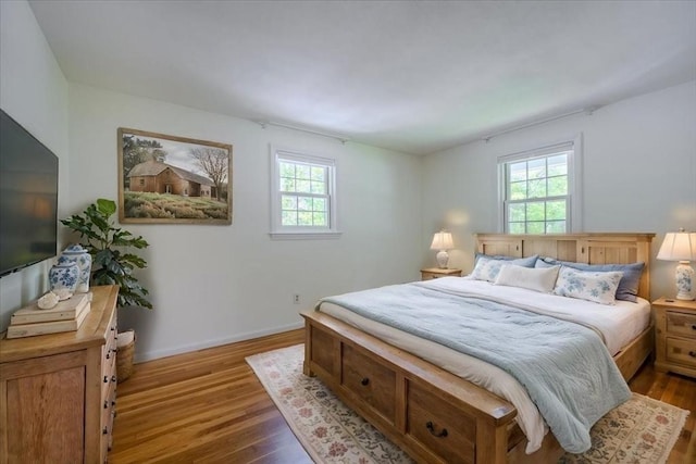 137 Naugler Ave, Marlborough, MA 01752 - bedroom featuring multiple windows, wood finished floors, and baseboards