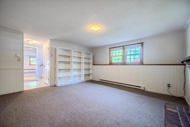 137 Naugler Ave, Marlborough, MA 01752 - spare room with a baseboard radiator, carpet, wainscoting, crown molding, and a textured ceiling