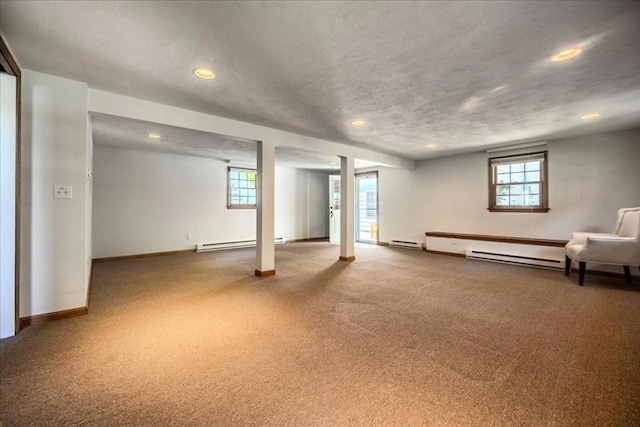 137 Naugler Ave, Marlborough, MA 01752 - basement featuring carpet flooring, plenty of natural light, recessed lighting, and a baseboard radiator