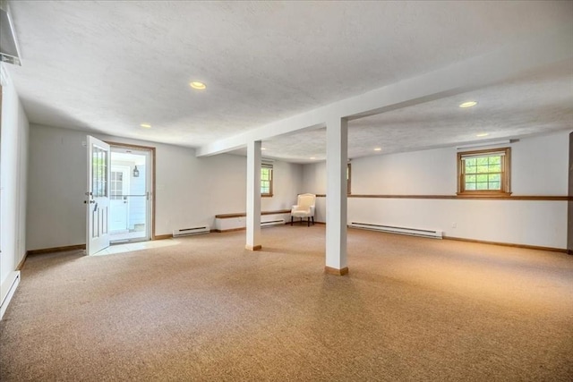 137 Naugler Ave, Marlborough, MA 01752 - basement featuring a baseboard radiator, recessed lighting, baseboards, and carpet flooring