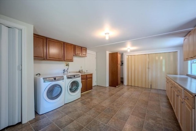 137 Naugler Ave, Marlborough, MA 01752 - laundry room with cabinet space, washing machine and clothes dryer, and stone finish flooring