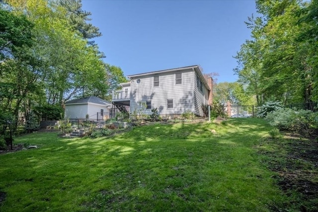 137 Naugler Ave, Marlborough, MA 01752 - back of house with stairs, a chimney, and a garden