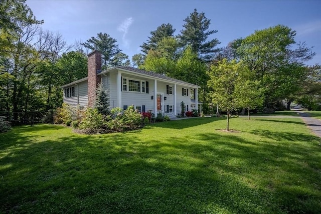 137 Naugler Ave, Marlborough, MA 01752 - split foyer home featuring a chimney and a front lawn