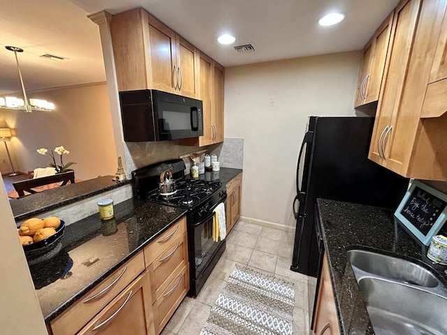97 Anderer Ln Unit 105, Boston, MA 02132 - kitchen featuring a sink, dark stone counters, black appliances, and visible vents