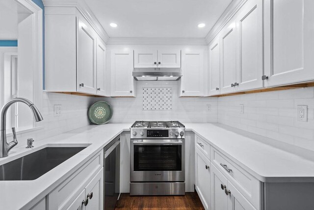 bathroom with a bathing tub, baseboard heating, and hardwood / wood-style flooring