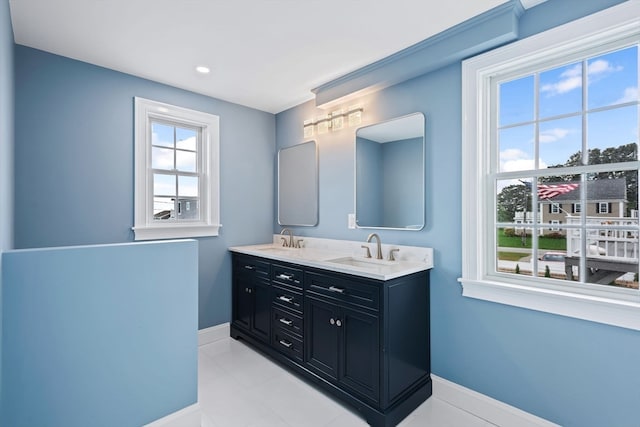 bathroom with vanity and tile patterned flooring