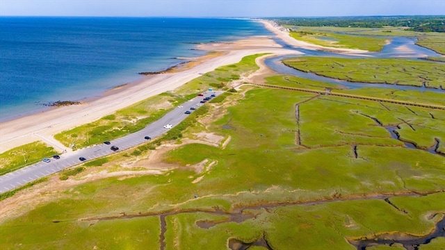 aerial view with a beach view and a water view