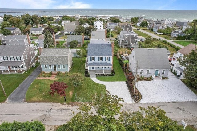 aerial view featuring a water view and a view of the beach