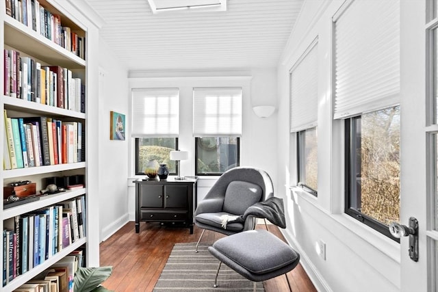 living area with dark hardwood / wood-style flooring