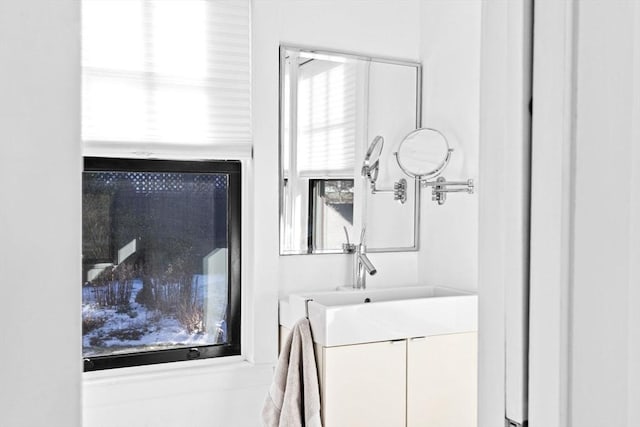 bathroom featuring vanity and plenty of natural light