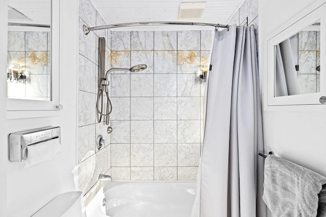 bathroom featuring shower / bathtub combination with curtain