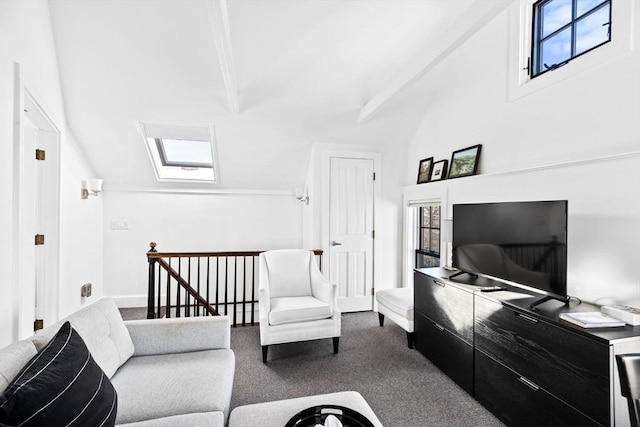 carpeted living room with vaulted ceiling with skylight