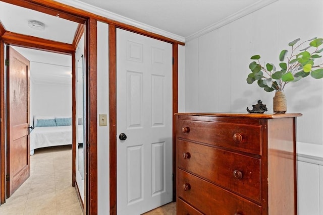 corridor featuring ornamental molding