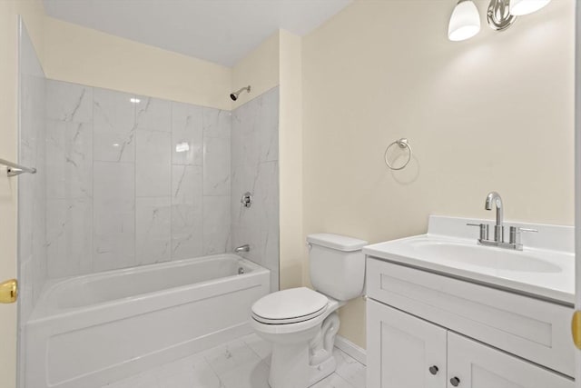 bathroom with marble finish flooring, toilet, vanity, baseboards, and shower / bath combination