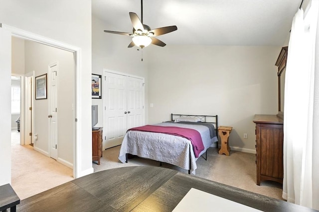 bedroom featuring baseboards, ceiling fan, light carpet, and high vaulted ceiling