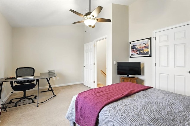 bedroom featuring high vaulted ceiling, baseboards, light carpet, and a ceiling fan
