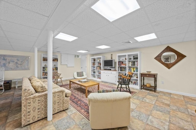 21 Gramps Way, Chatham, MA 02659 - living area featuring stone tile flooring and a paneled ceiling