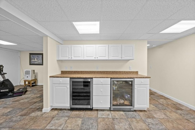 21 Gramps Way, Chatham, MA 02659 - indoor dry bar featuring wine cooler, a drop ceiling, and light stone finish floors