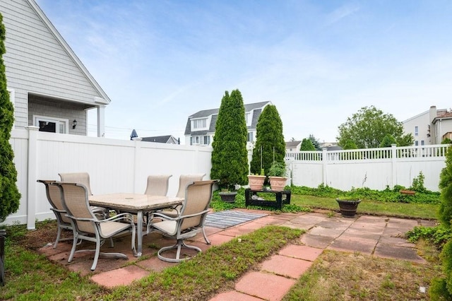 1 Carter Ave, Salisbury, MA 01952 - fenced backyard with a patio and outdoor dining space