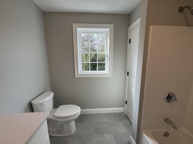 full bath with toilet, shower / tub combination, baseboards, and vanity