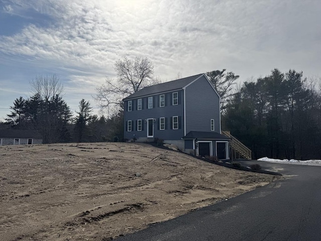 view of front of house featuring a garage and driveway