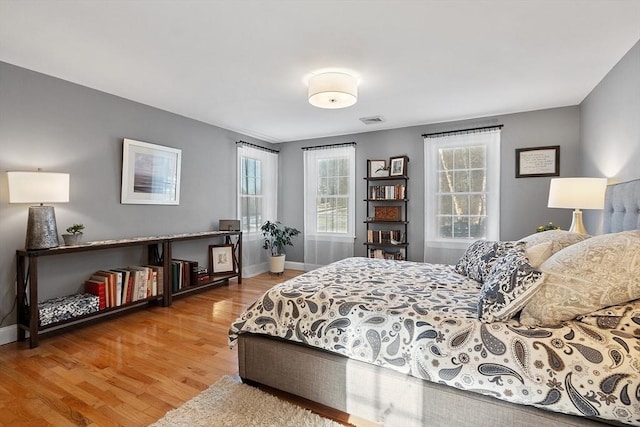 bedroom featuring hardwood / wood-style flooring