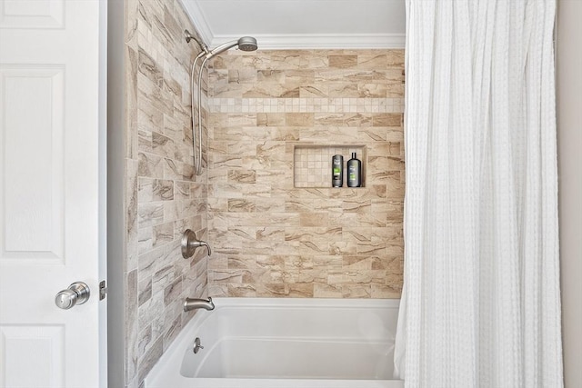 bathroom with ornamental molding and shower / bath combination with curtain